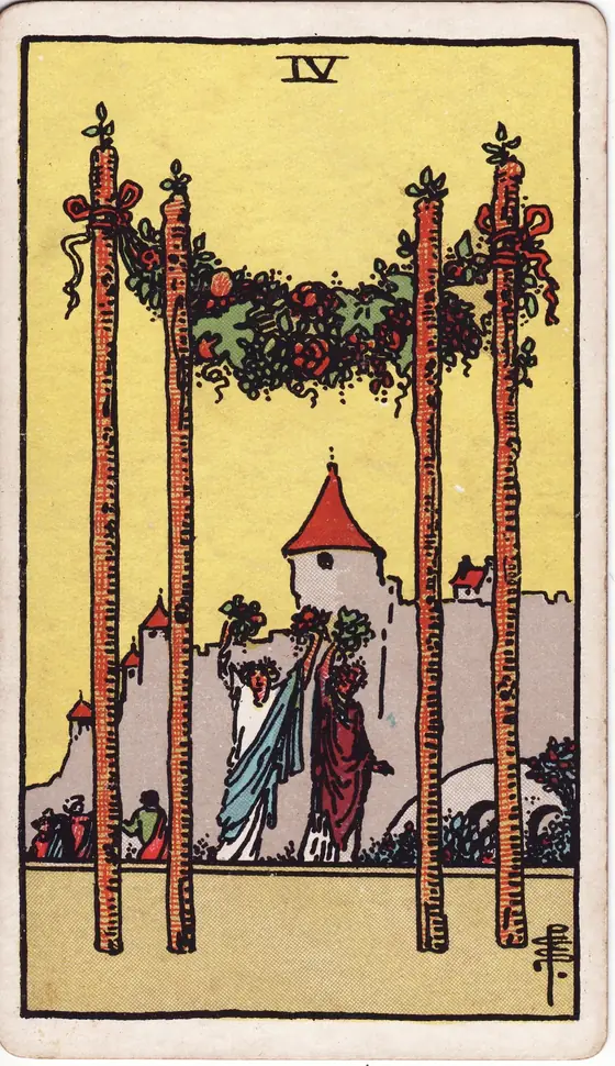 Four of Wands tarot card from the Rider-Waite-Smith deck: four garlanded staves forming a canopy before a castle, celebrants raising bouquets beneath it.