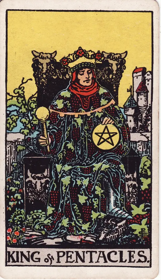 King of Pentacles tarot card from the Rider-Waite-Smith deck: a king in a vine-embroidered robe enthroned amid grapes, a pentacle resting on his knee.