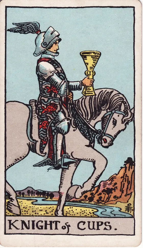Knight of Cups tarot card from the Rider-Waite-Smith deck: an armoured rider on a walking white horse, holding his cup out before him.