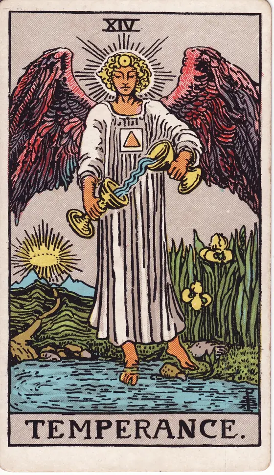 Temperance tarot card from the Rider-Waite-Smith deck: a winged angel with one foot in the water, pouring liquid between two cups.
