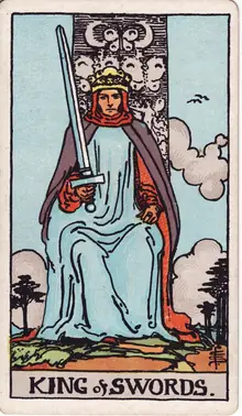 King of Swords tarot card from the Rider-Waite-Smith deck: a king enthroned facing forward, his sword held upright and tilted to one side.