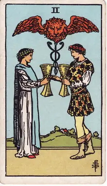 Two of Cups tarot card from the Rider-Waite-Smith deck: a man and a woman exchanging cups beneath a winged lion's head and a caduceus.