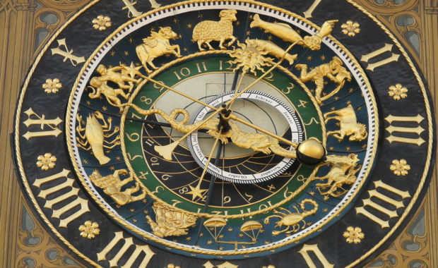image of black and gold zodiac clock